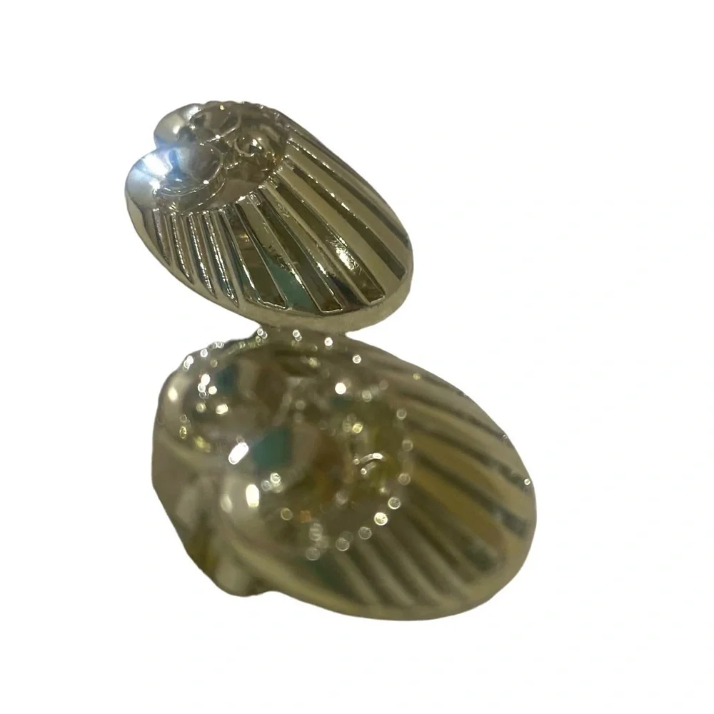 Vintage Charel white gold-tone ribbed fan clip on earrings marked